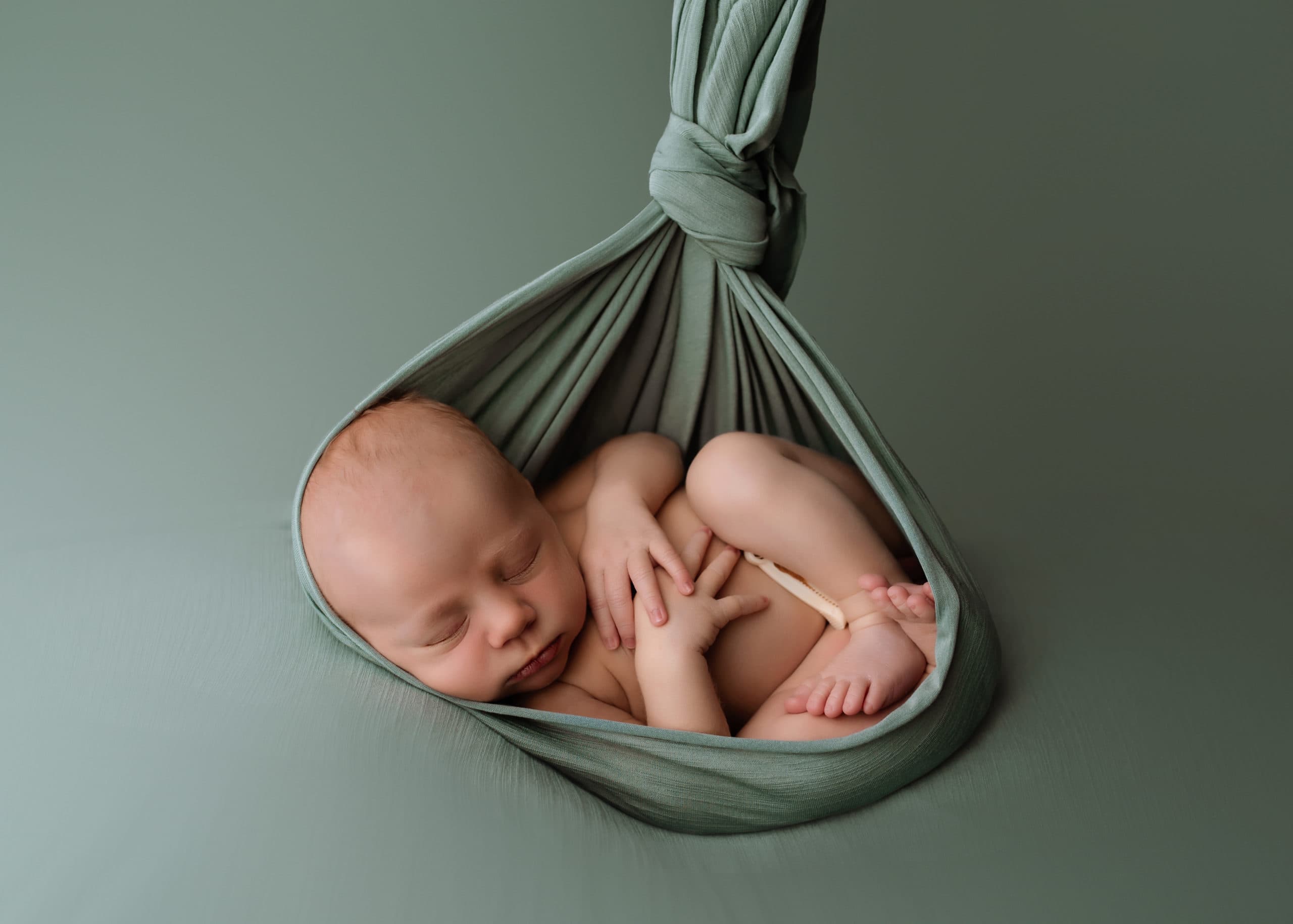 newborn photography, newborn baby in green, prince george BC